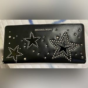 Authentic Michael Kors leather silver bead star adorned wallet